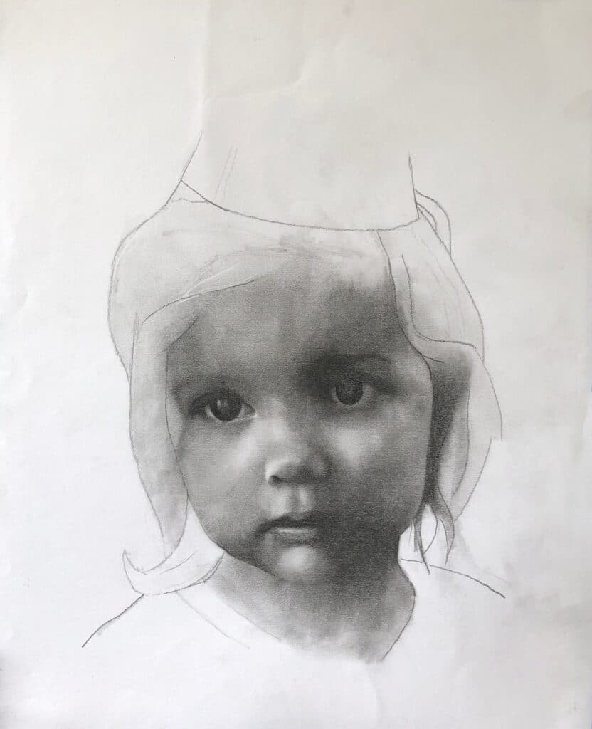 A pencil drawing of a young child with detailed shading on the face and eyes. The hair and upper head are outlined but not fully shaded, giving the portrait an unfinished, in-progress appearance.